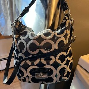 a Coach Kristin Op Art Hobo bag, with Tiffany blue inside